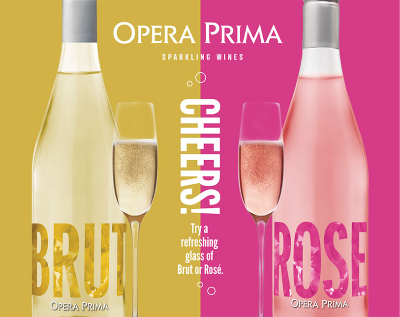 Two bottles of sparkling wine, one Brut (yellow label) and one Rosé (pink label), each with a filled flute glass. Text reads Opera Prima Sparkling Wines. Cheers! Try a refreshing glass of Brut or Rosé.