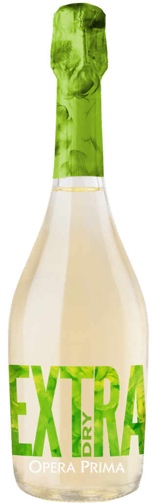 A bottle of Opera Prima sparkling wine with a green foil top and large green text reading EXTRA DRY on the front label. The wine inside appears light and pale in color.
